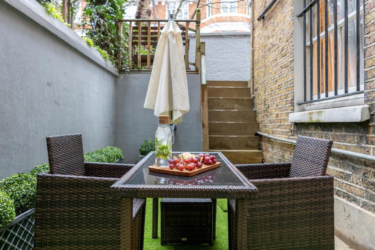 Elegant Kensington Apartment With Patio Londres Exterior foto